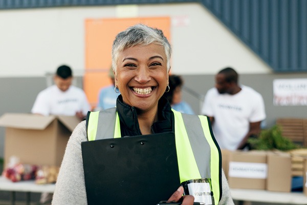 Woman in high vis jacket at charity event